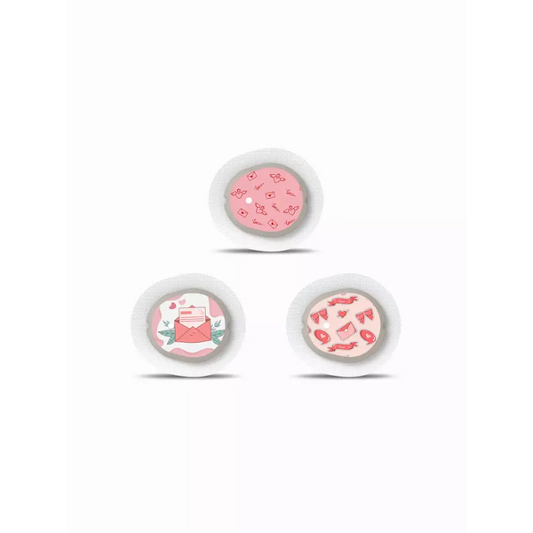 Valentine-themed Dexcom G7 sensor stickers, pink design, festive diabetes accessories.