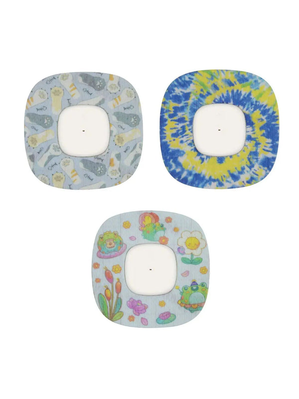 Colorful Simplera sensor patch for kids with animal and space prints.