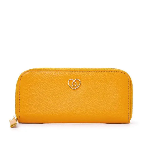 Stylish yellow diabetic case from Sweet Collection, made of genuine leather with a secure zip closure for diabetes care essentials.