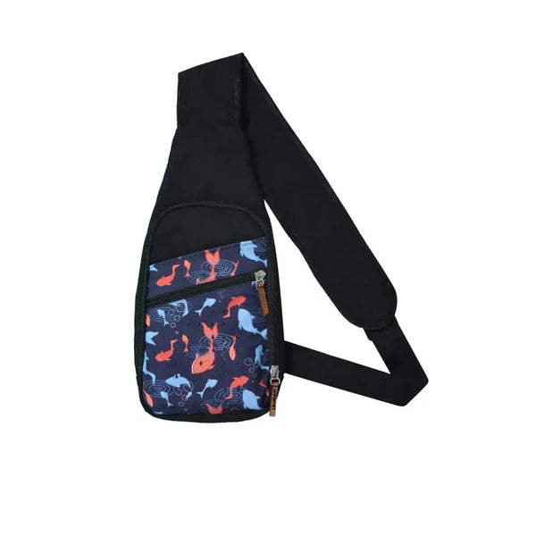Black shoulder bag with colorful fish print front pocket and insulin cooling system for kids with diabetes