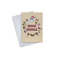 Elegant Christmas greeting card with festive icons and "Buon Natale" text, accompanied by an envelope.