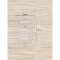 CGM Sensor Patch Template on wooden surface, dimensions 7cm by 10cm, transparent acrylic design.