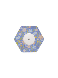 FreeStyle Libre 2 hexagonal shape patch in Meadow floral design, breathable adhesive patch to help support sensor wear
