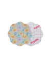 FreeStyle Libre 3 cookie shape patch front and back view, showing printed fabric and adhesive side for sensor support