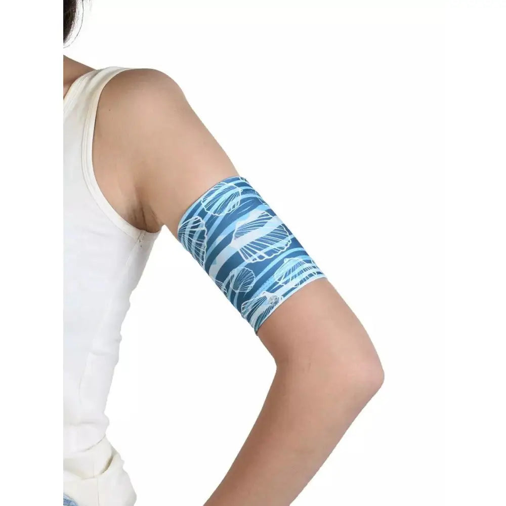Glucose sensor armband with sea and beach design for diabetes device protection.