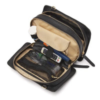 Leather diabetic supplies shoulder bag with multiple compartments and adjustable strap.