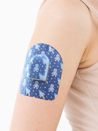 Αυτοκόλλητο επίθεμα για pod Omnipod, σχέδιο Astronaut, στο μπράτσο
