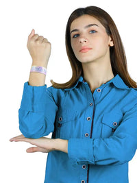 Reversible Diabetes Awareness Wristband in vibrant colors, worn by a person, featuring summer prints and the word "Diabetic".