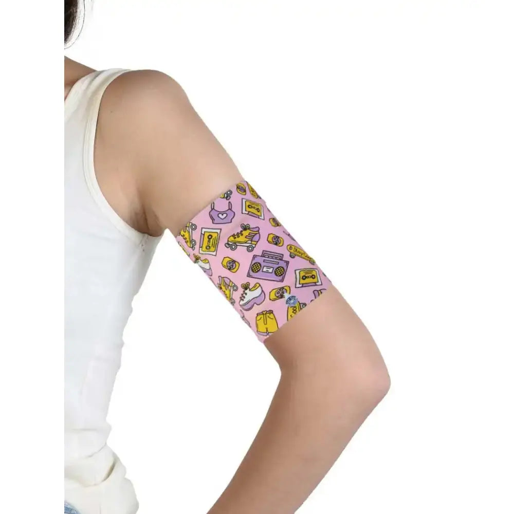 Protective armband for glucose sensor on upper arm with colorful teenager design